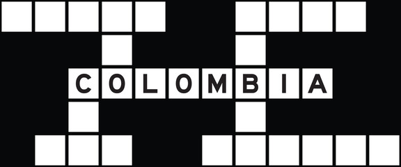 Alphabet letter in word colombia on crossword puzzle background