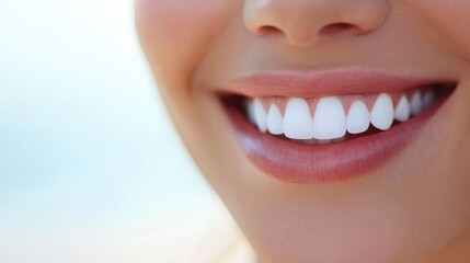 Obraz premium A woman with a big smile showing her teeth