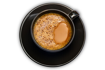 Top view of hot milk coffee in black ceramic cup isolated on white background with clipping path.