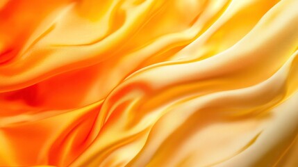 Obraz premium Silk Fabric Drapes in a Vibrant Orange to Yellow Gradient With a Smooth, Luxurious Texture