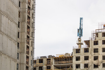 Modern construction site with cranes in operation