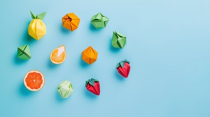 Top view, a simple and vibrant origami mixed fruit composition arranged symmetrically on a pastel blue background, fresh and bold