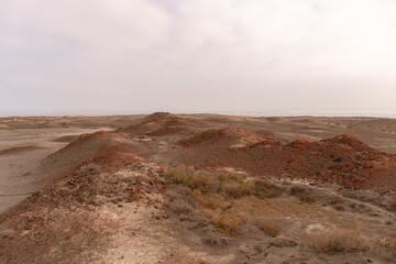 Burnt volcanic rock near the mud volcanoes near the village of Alyat.  Azerbaijan.