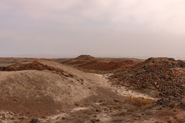 Burnt volcanic rock near the mud volcanoes near the village of Alyat.  Azerbaijan.