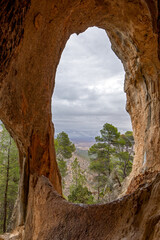 Vertical view of the Balcon de Lorca, a peculiar rock formation with caves and holes overlooking the Sierra del Gigante, Lorca, Region of Murcia, Spain