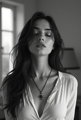 Fototapeta premium Serene Woman in Black and White Portrait