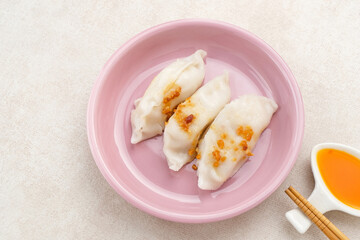 Choipan, made from rice flour filled with shredded jicama and sprinkled with fried garlic. Traditional steamed snack from Pontianak, Indonesia.
