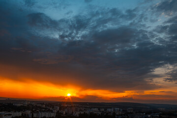 Colourful landscape of beautiful sunset or sunrise with cloudy sky. Natural abstract background.