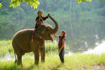 The hill tribe couple's happiness is contagious, spreading joy to all who see them.