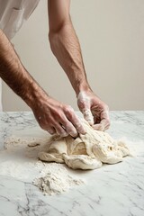 Men's hands knead the dough