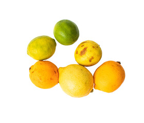 rotten lemons and limes on a white background, not fresh citrus fruits