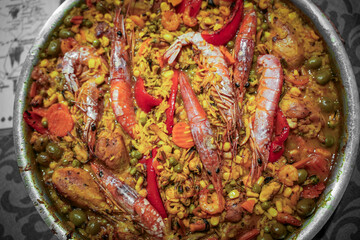 Typical spanish dish paella with rice and shrimps