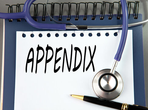 APPENDIX is a word on a white sheet against a stethoscope.