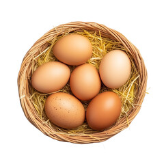 A wicker basket filled with six brown and beige eggs, placed on a bed of hay