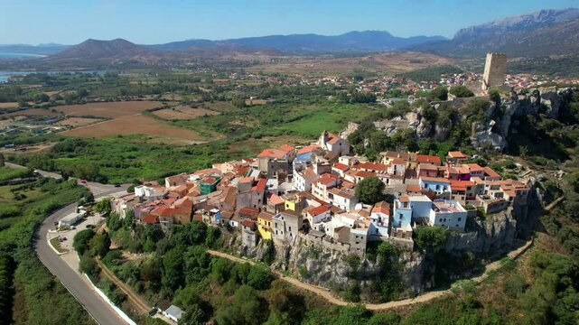Posada- beautiful hill top traditional village in Sardinia (Sardegna island), Italy.  aerial high angle drone video
