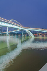 Night lighting of city bridges on the Pearl River in Guangzhou
