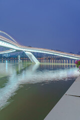 Night lighting of city bridges on the Pearl River in Guangzhou