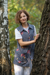 Portrait of a young beautiful girl in the forest.