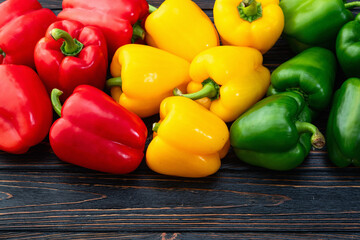 Fresh sweet bell pepper ( paprika ) photography red , green and yellow . Colorful vegetable . Top view