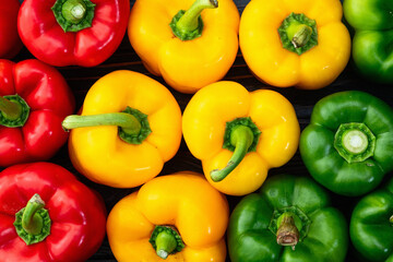 Fresh sweet bell pepper ( paprika ) photography red , green and yellow . Colorful vegetable . Top view