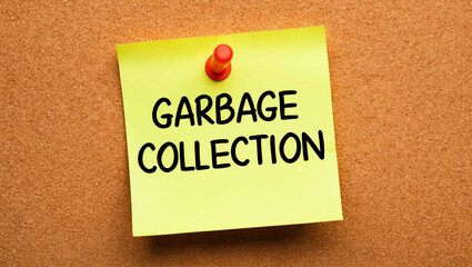 Garbage collection word written on a note sticky on corkboard