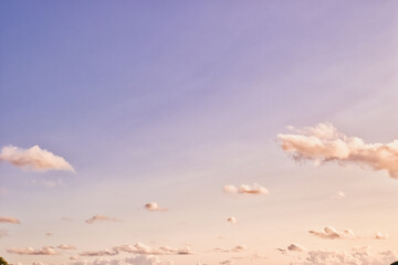 Serene Dusk Sky with Fluffy Clouds