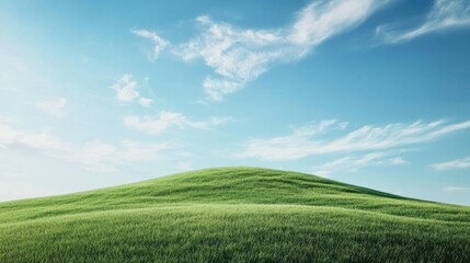 Naklejka premium Rolling green hill under a bright blue sky with white clouds.