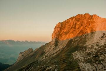 the mountains during the sunrise