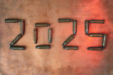 The numbers 2025 are made of bullet casings. The number five is highlighted in red. Grunge copper...