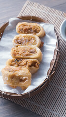 Gohyong is typical chinesse food served with sliced ​​chilies and cuko sauce.