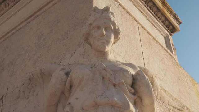 Discover mesmerizing stone details of ancient sculptures beneath the warm sun's glow
