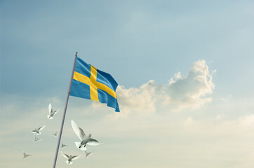 Sweden flag waving with flying doves in beautiful sky. Sweden flag for Republic Day and Independence Day.