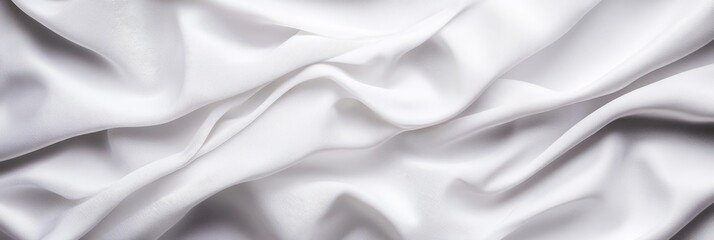 Obraz premium Abstract white fabric with a wrinkled texture, perfect for product displays, branding, or minimalist designs.