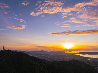 aerial view A serene landscape capturing the soft hues of dawn as mist settles over distant mountain ranges under a pastel-colored sky. Amazing pink sky at sunrise. gradient color sky texture ..
