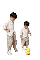 Two young Asian children in casual outfits playing with a toy duck, isolated on white background. Perfect for parenting and childhood themes. transparent PNG white background.