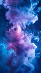 Fototapeta premium Blue and purple smoke forming mysterious shapes on dark background