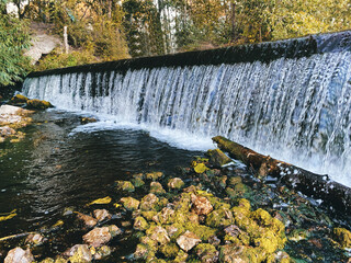 Background Lipetsk dam waterfall water flowing down the rocks 
