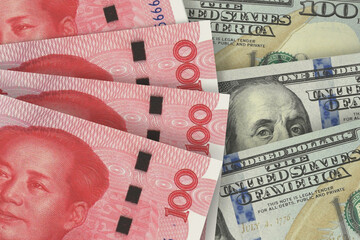 Chinese Yuan and US Dollar Banknotes. Cash. Financial Concept.
