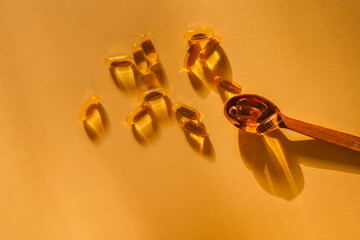 Omega 3 vitamins on a bright background, copy space