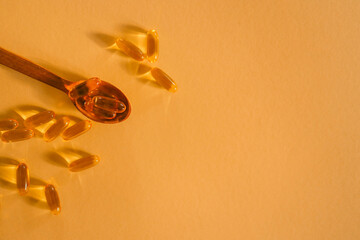 Omega 3 vitamins on a bright background, copy space