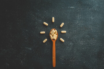 Natural vitamins organic on dark background