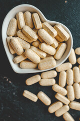 Vitamin capsules for the heart top view