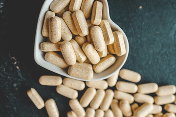 Vitamin capsules for the heart top view