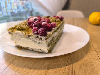 Cottage cheese sponge cake with cranberries on a plate. High quality photos