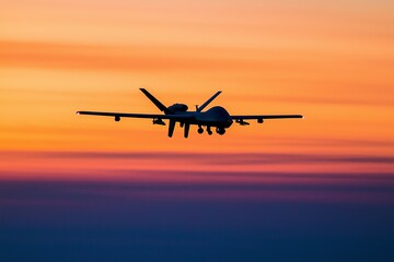 Silhouette of drone aircraft, flying at sunset, dramatic sky in background, aerial technology concept