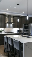A modern kitchen featuring sleek stainless steel appliances, quartz countertops, and minimalist