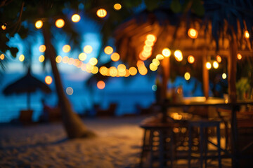Blur and bokeh of beach bar restaurant in the evening. Abstract defocused background. String lights are glowing above a beachfront bar at sunset creating a romantic bokeh effect