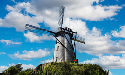 Heeze (Sint Victor Mill), Netherlands - July 9. 2024: Historic dutch windmill from 18th century on hill (focus on center)