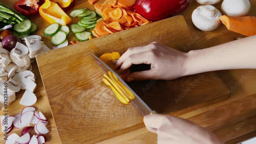 Sticker woman cooking fresh lunch, chopping yellow bell pepper on cutting board at kitchen