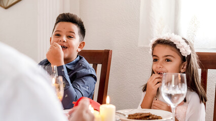 Happy kids during Christmas lunch